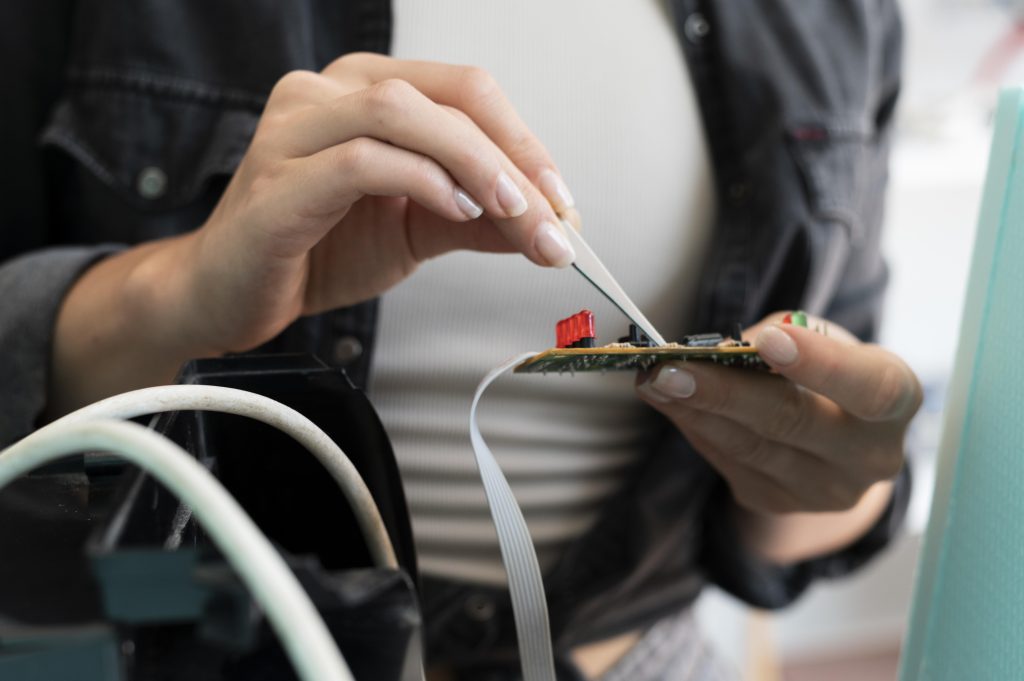 female inventor working new creation